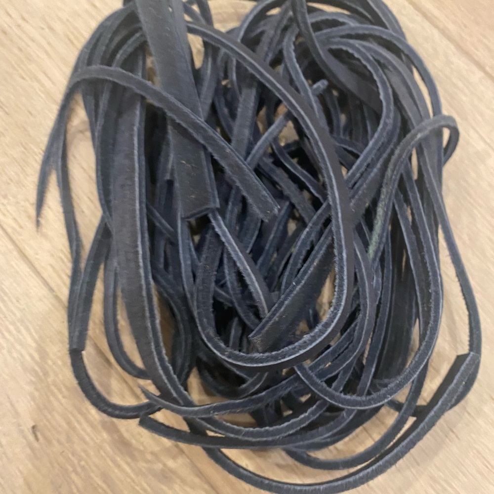 Black leather stripes vary in length